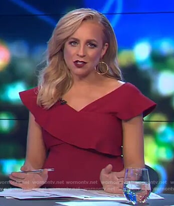 Carrie’s red ruffle off shoulder dress on The Project