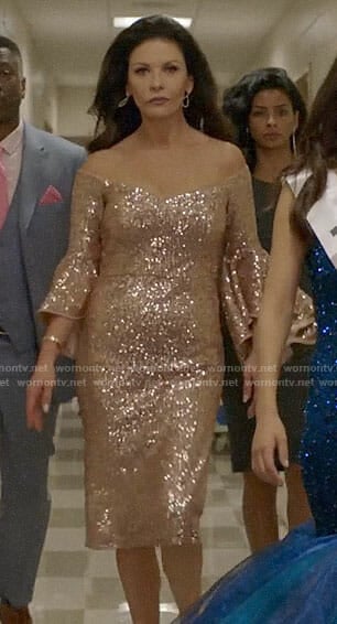 Vicki’s sequin off-shoulder dress on Queen America