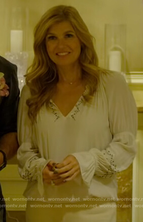 Debra’s white v-neck embellished top on Dirty John
