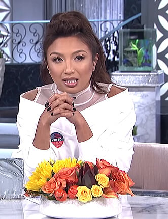 Jeannie’s white mesh off shoulder sweatshirt on The Real