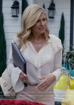 Debra’s white sheer ruffle blouse on Dirty John