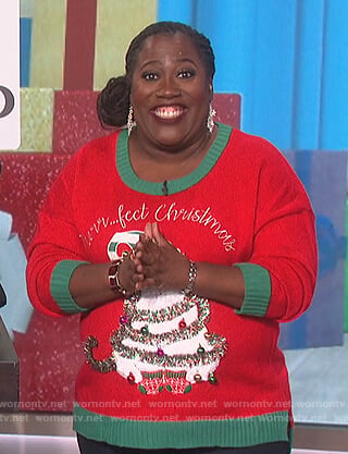 Sheryl’s red Christmas cat sweater on The Talk