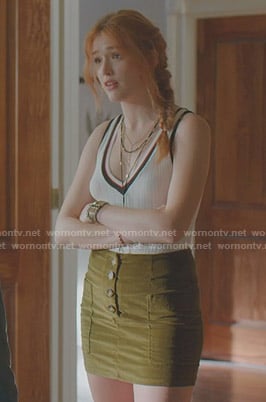 Kirby’s white ribbed top and green mini skirt on Dynasty