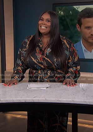 Nina’s black belt print jumpsuit on E! News