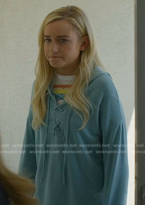 Terra’s rainbow print tee and blue lace-up hoodie on Dirty John
