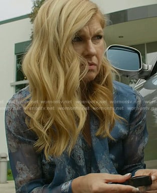 Debra’s blue floral tie neck blouse on Dirty John