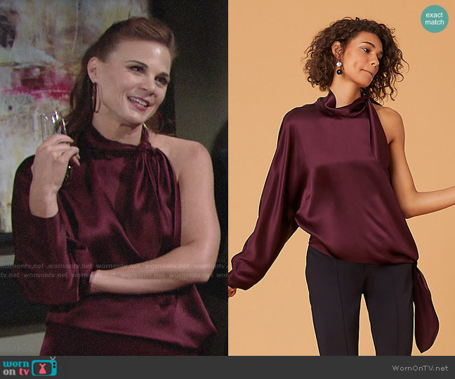 Diane von Furstenberg One Shoulder Knotted Blouse in Cabernet worn by Phyllis Newman (Gina Tognoni) on The Young and the Restless