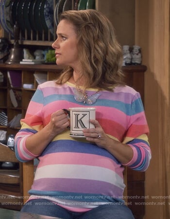 Kimmy’s multicolored striped sweatshirt on Fuller House