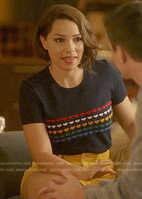 Nora’s heart print top and yellow corduroy skirt on The Flash