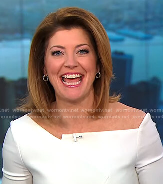 Norah’s white asymmetric top on CBS This Morning