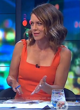 Gorgi’s orange twist strap sleeveless dress on The Project
