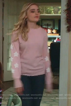 Taylor’s pink star sleeve distressed sweater on American Housewife