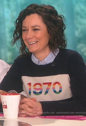 Sara’s navy 1970 graphic sweater on The Talk