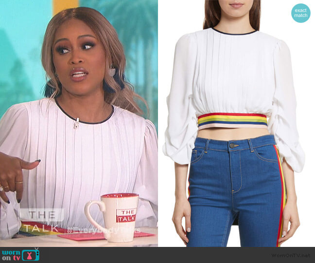 Alice + Olivia Dakota Tack Sleeve Top worn by Eve on The Talk