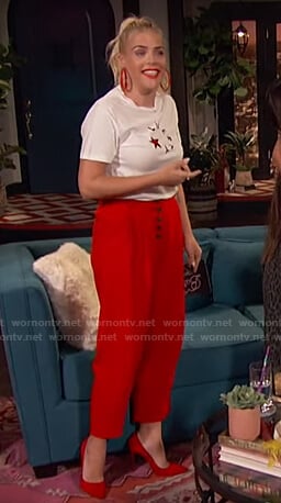 Busy’s white Liberty print tee and red cropped pants on Busy Tonight