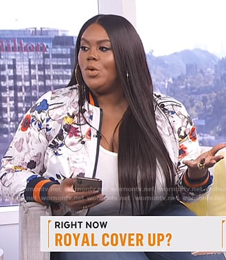 Nina’s white floral bomber jacket on Live from E!