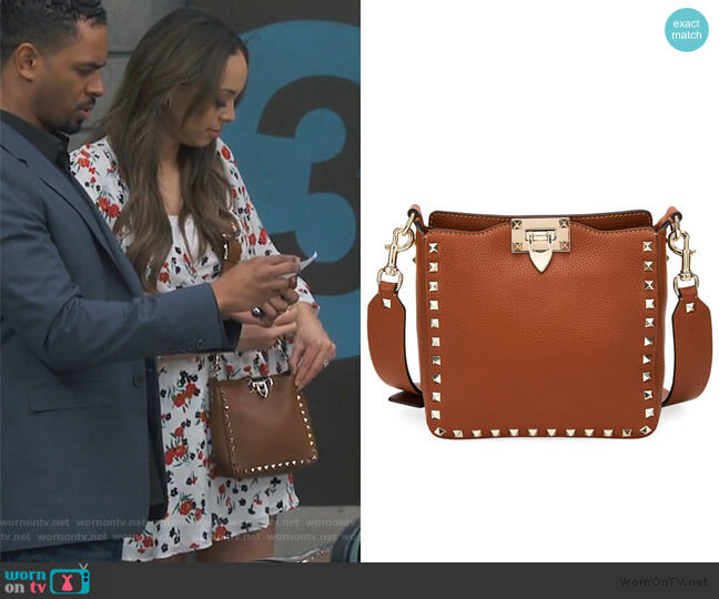 Valentino Rockstud Small Vitello Leather Hobo Bag worn by Claire (Amber Stevens West) on Happy Together