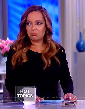 Sunny’s black shoulder button sweater and zebra striped skirt on The View