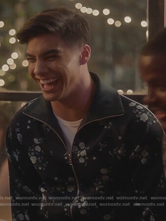 Vivek’s navy floral bomber jacket on Grown-ish