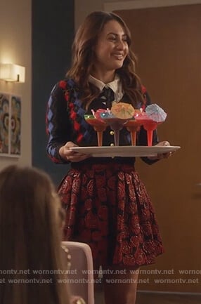 Ana’s black rose mini skirt on Grown-ish