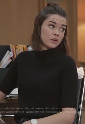 Callie’s black short sleeve mock neck sweater on Good Trouble