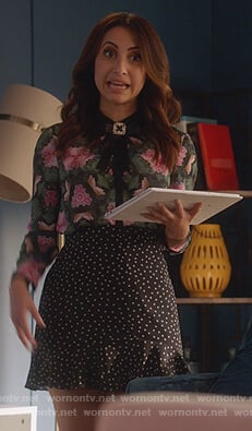 Ana’s black star print mini skirt on Grown-ish