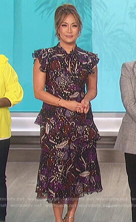 Carrie’s purple floral metallic print dress on The Talk