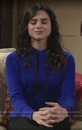 Lola’s blue hoodie and ankle booties on The Young and the Resltess