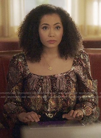 Macy’s metallic floral blouse and fanned necklace on Charmed