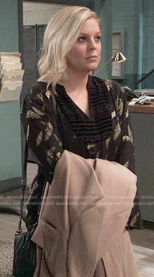 Maxie’s black and gold feather blouse on General Hospital