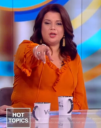 Ana’s orange ruffle drawstring blouse on The View