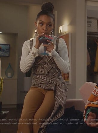 Zoey’s plaid draped top and white ribbed sweater on Grown-ish