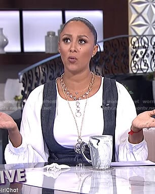 Tamera’s white top and denim jumpsuit on The Real