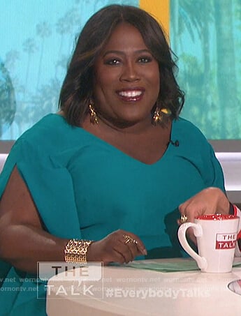 Sheryl’s teal slit sleeve top on The Talk