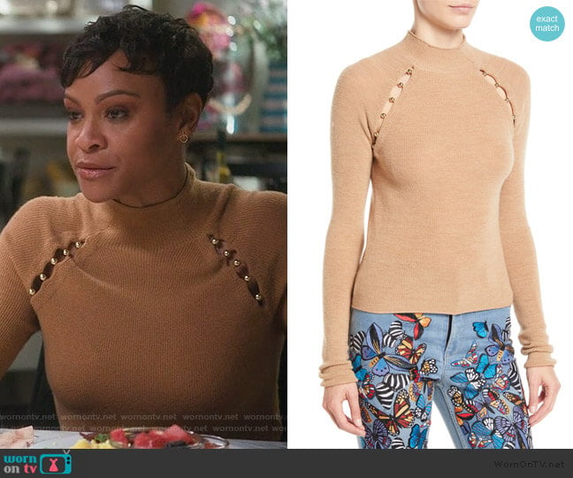 Alice + Olivia Jennifer Mock-Neck Raglan Slit Pullover worn by Angela (Carly Hughes
) on American Housewife