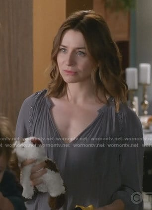 Amelia’s grey v-neck blouse on Grey’s Anatomy