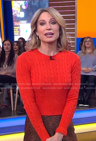 Amy’s red cable knit sweater and metallic skirt on Good Morning America
