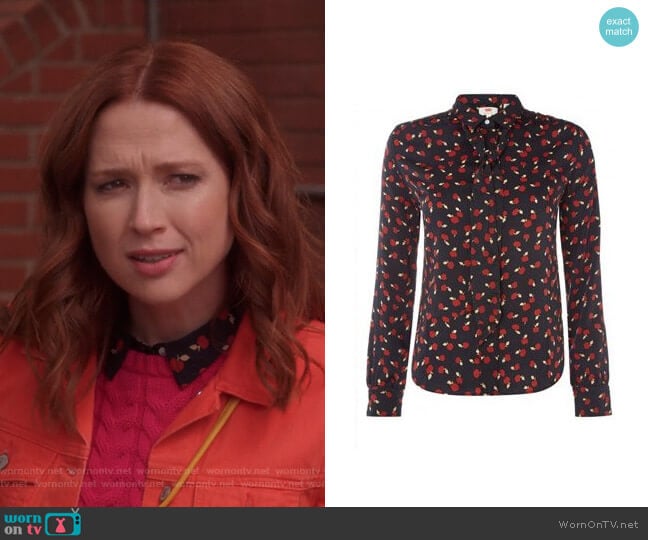 Levis Apple Print Blouse worn by Kimmy Schmidt (Ellie Kemper) on Unbreakable Kimmy Schmidt