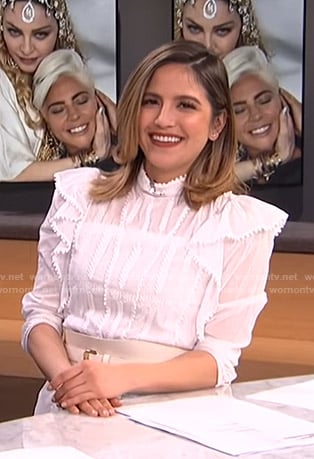 Erin’s white ruffled dress on E! News