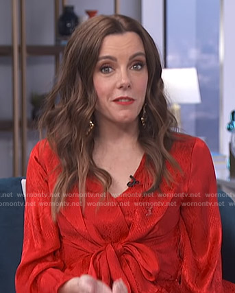 Melanie’s red knot front dress on Live from E!