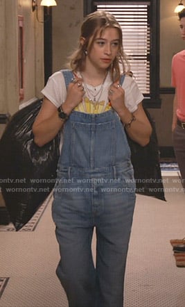 Shannon’s white graphic tee and denim overalls on Fam