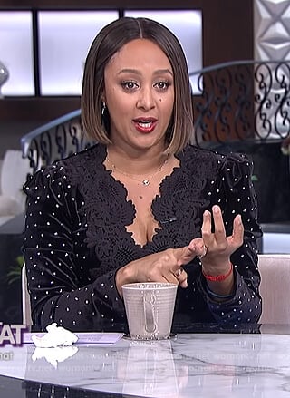 Tamera’s black embellished jumpsuit on The Real