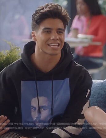 Vivek’s black print hoodie and white pants on Grown-ish