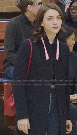 Cara’s navy coat with striped ribbed collar on God Friended Me