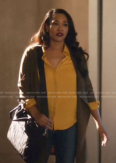 Iris’s green draped jacket on The Flash