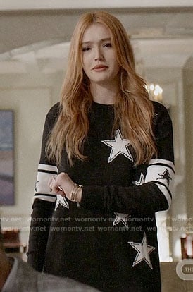 Kirby’s black star print sweater on Dynasty
