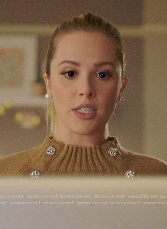 Lucy’s tan sweater with jewel buttons on Charmed