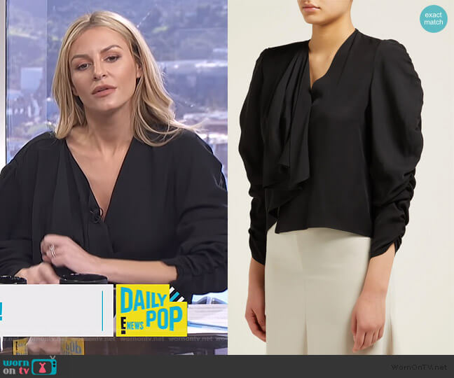 A.W.A.K.E ruched sleeve top worn by Morgan Stewart on E! News