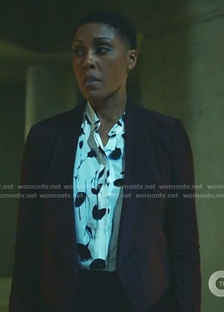 Lynn’s white floral print blouse on Black Lightning