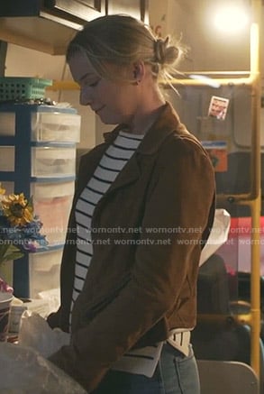 Nic’s white striped side zip sweater on The Resident